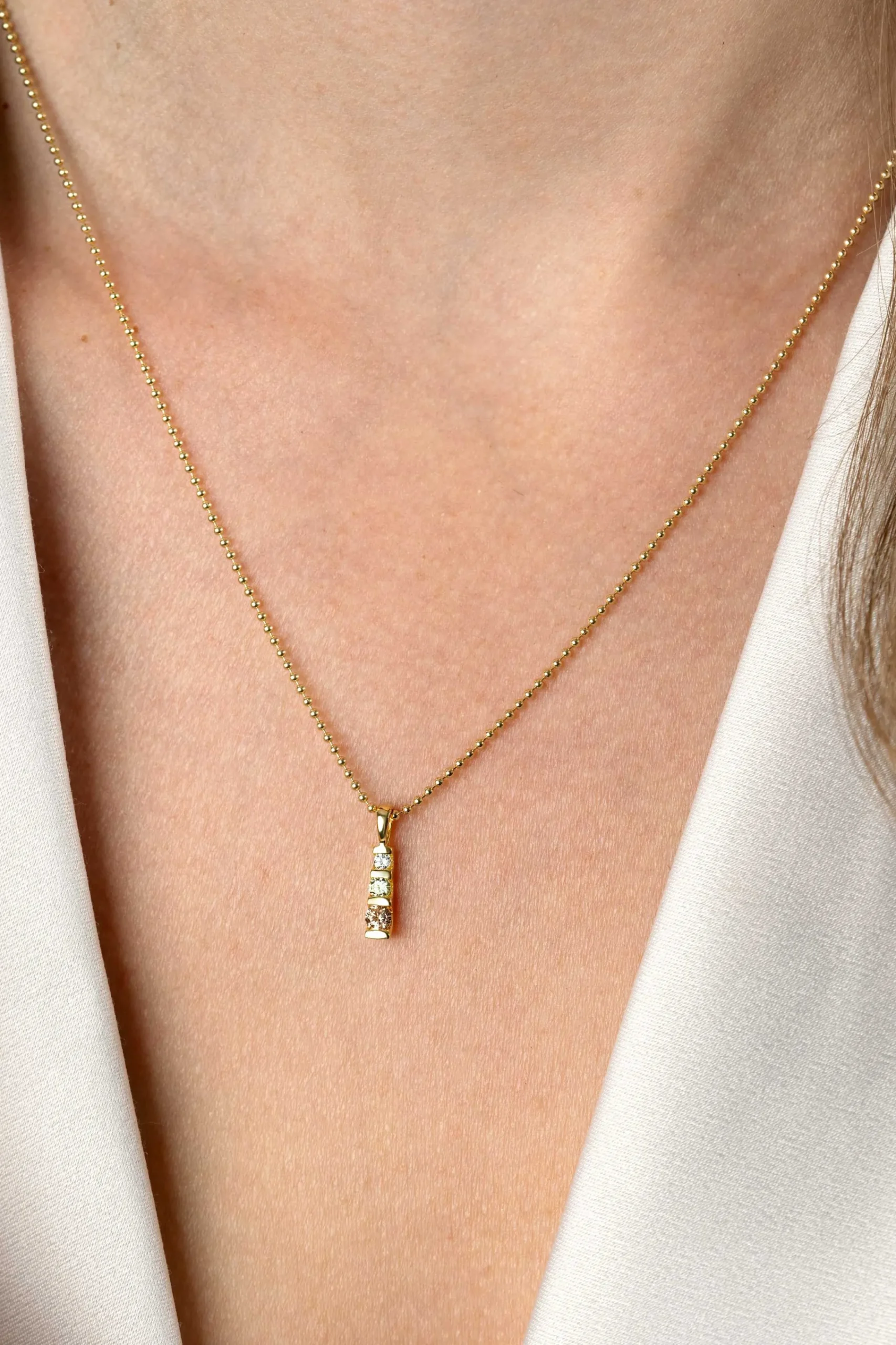 Zinzi 15mm gold plated zilveren hanger bezet met champagne, peridot en witte zirconia ZIH2612 (zonder collier)
