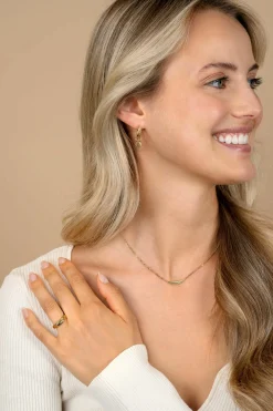 Zinzi 11mm gold plated zilveren oorbedels in ronde vorm, bewerkt met veertjesmotief ZICH2644G (zonder oorringen)