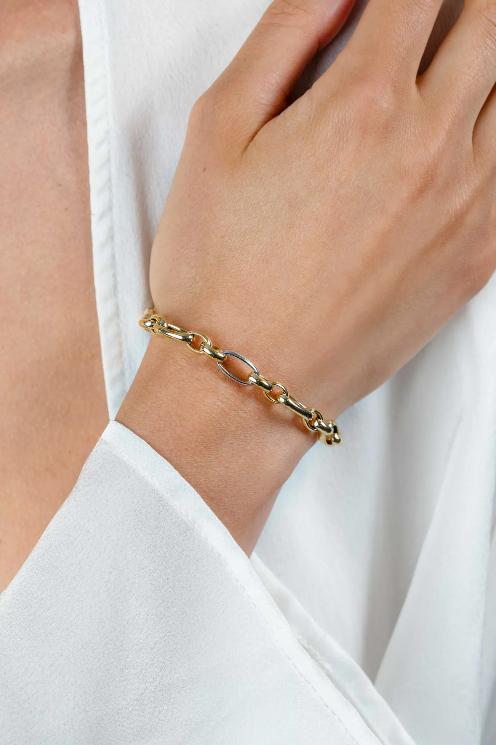 Online Zinzi bicolor schakelarmband (7mm breed) met afwisselend gold plated jasseron schakels en grote zilveren ovale schakels 19cm ZIA2639