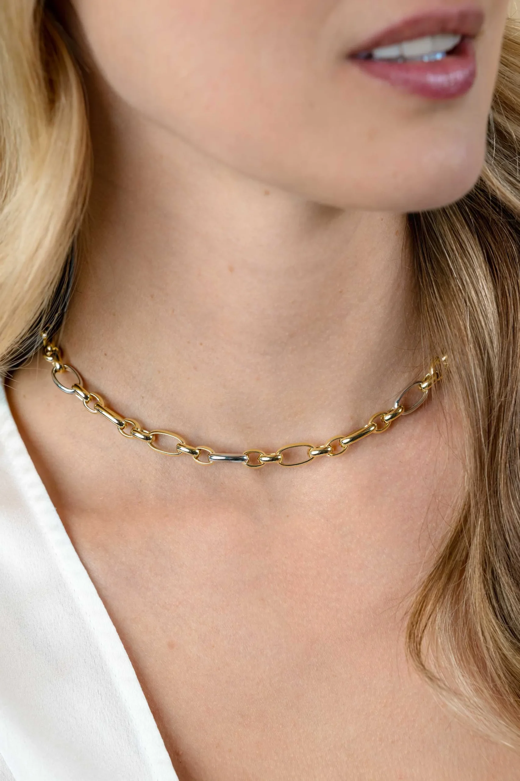 Outlet Zinzi bicolor schakelketting (7mm breed) met afwisselend gold plated jasseron schakels en grote zilveren ovale schakels 45cm ZIC2639