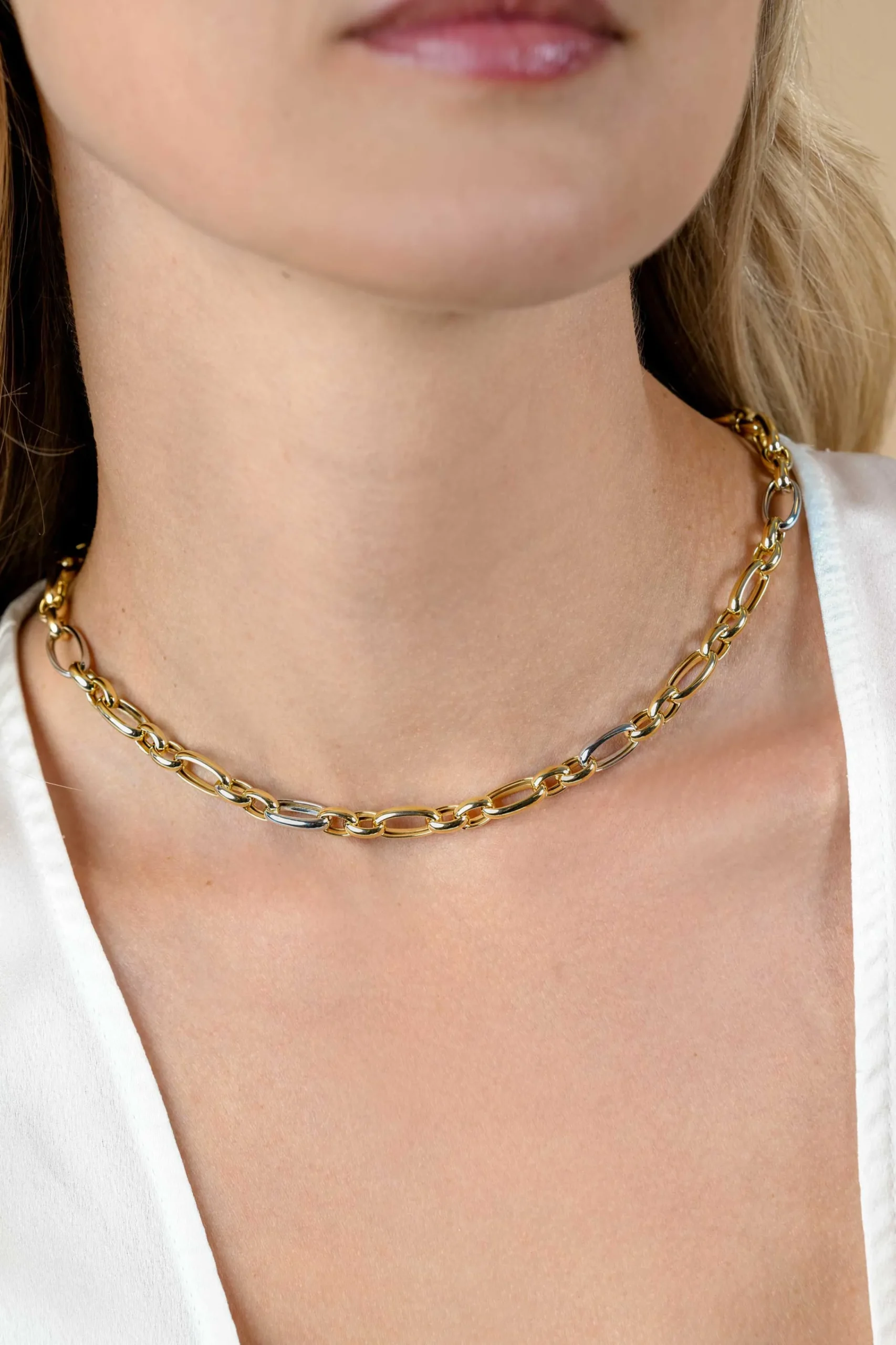 Outlet Zinzi bicolor schakelketting (7mm breed) met afwisselend gold plated jasseron schakels en grote zilveren ovale schakels 45cm ZIC2639