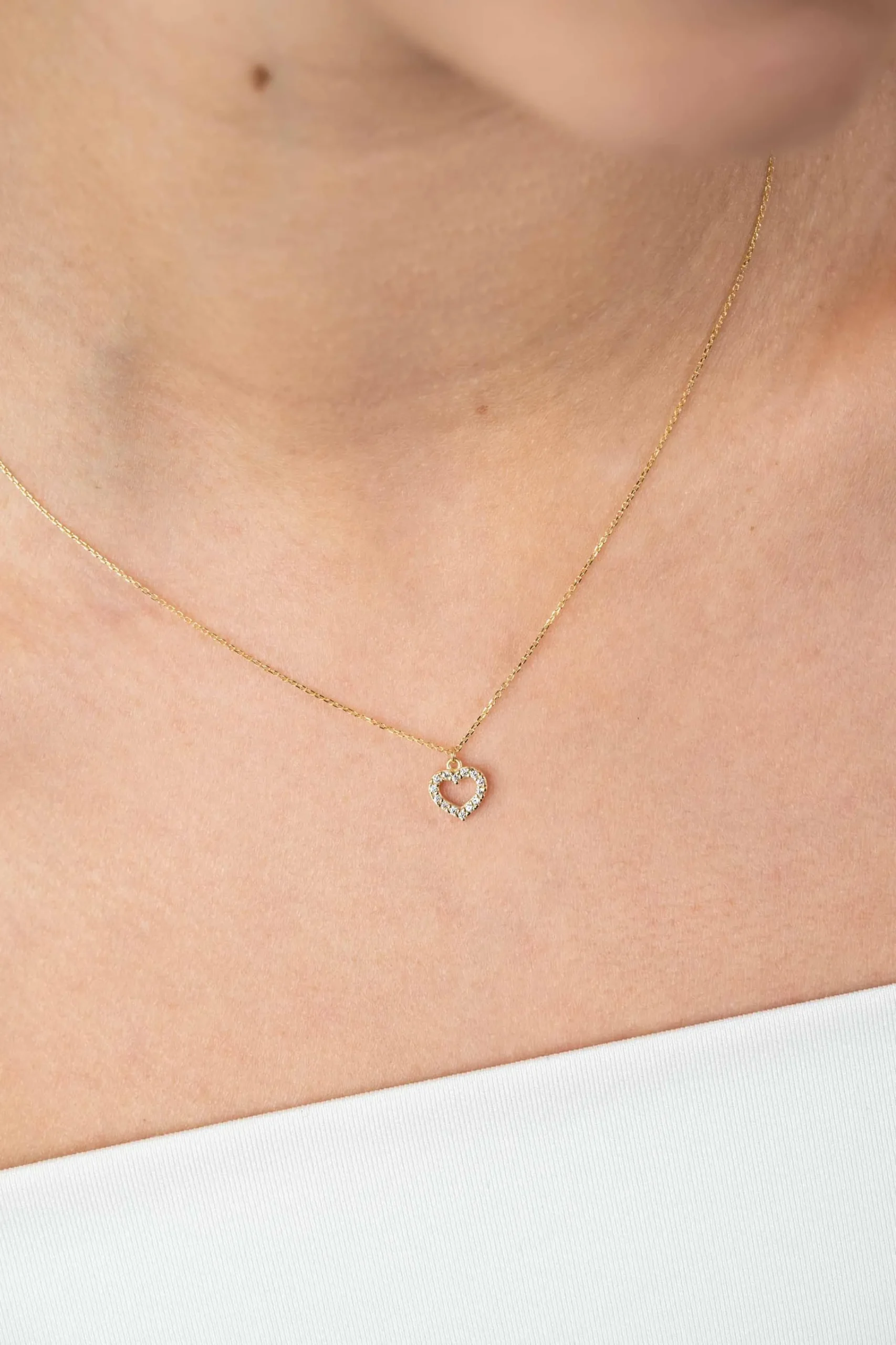 New Zinzi Gold 14 krt gouden anker ketting met sierlijk open hartje (7mm), bezet met witte zirconia's 40-42,5cm ZGC450