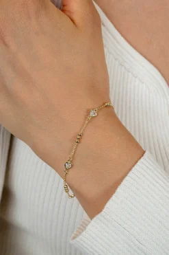 Sale Zinzi gold plated zilveren schakelarmband met trio-bolletjes en drie hartvormige zirkonia's 17-20cm ZIA2679