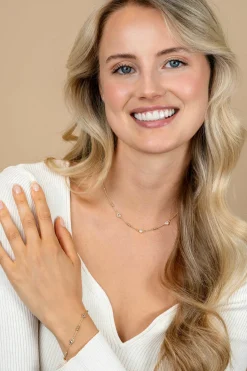 Sale Zinzi gold plated zilveren schakelarmband met trio-bolletjes en drie hartvormige zirkonia's 17-20cm ZIA2679