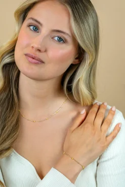 Best Zinzi gold plated zilveren fantasie ketting met 13 geelgroene donuts en glanzende bolletjes 42-45cm ZIC2508