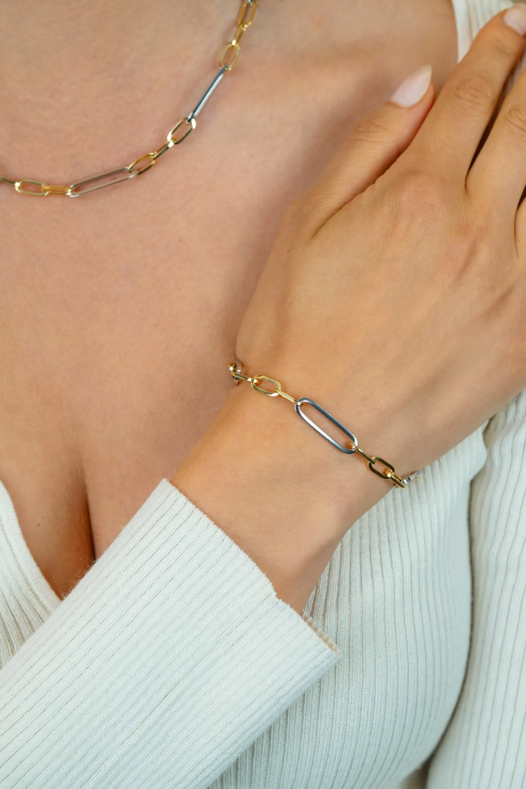 Outlet Zinzi zilveren bicolor schakelarmband met ovale schakels 7mm breed ZIA2752