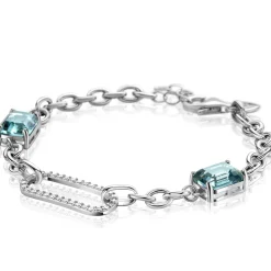 Online Zinzi zilveren fantasie schakel armband met ovale schakel, bezet met witte zirconia's en twee groenachtig blauwe (petrol) kleurstenen in vierpootszetting 18-21cm ZIA2487