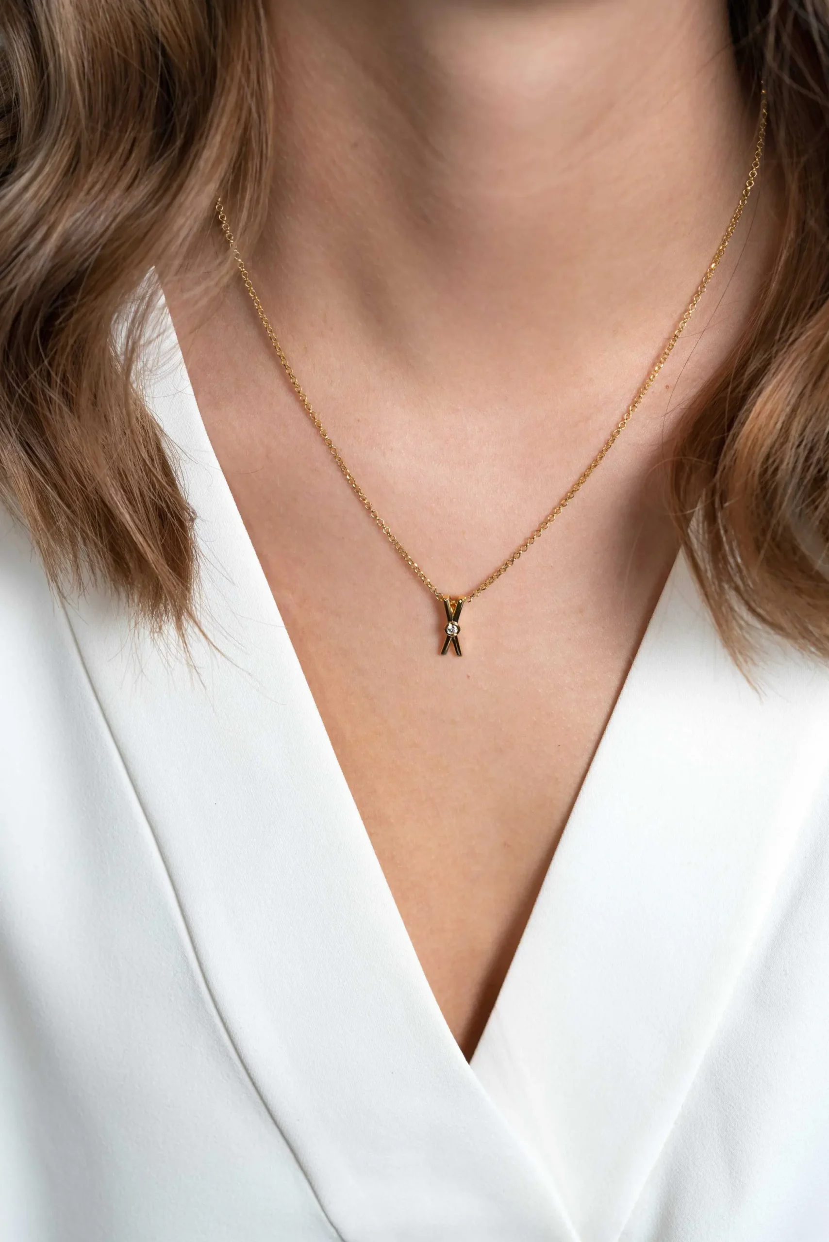 Outlet Zinzi zilveren hanger extra 14K geel verguld X-vorm witte zirconia ZIH2194Y (zonder collier)